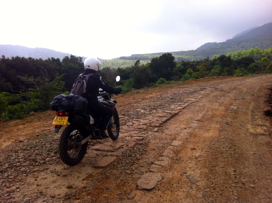 Colette in Sri Lanka back view on dirt road - 1